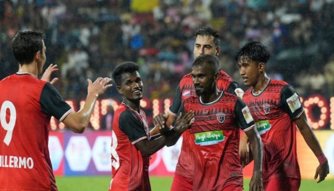 Odisha vs NorthEast United FC Match Prediction: Shocking Upset or Easy Win? 4 Odisha vs NorthEast United: NorthEast United FC team huddle before kickoff.